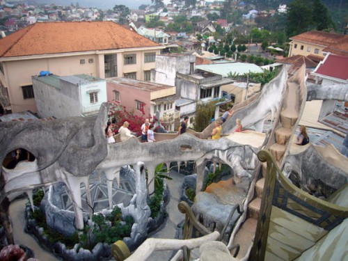 Crazy-House-in-Dalat-a-bridge-between-the-houses-and-the-views-of-the-surrounding-city.jpg